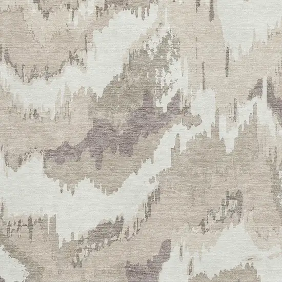Beige And Ivory Abstract Washable Area Rug With UV Protection Photo 4