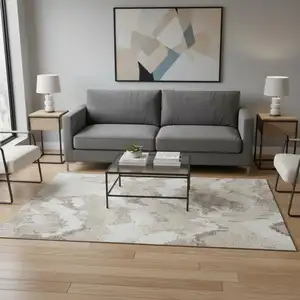 Photo of Beige And Ivory Abstract Washable Area Rug With UV Protection