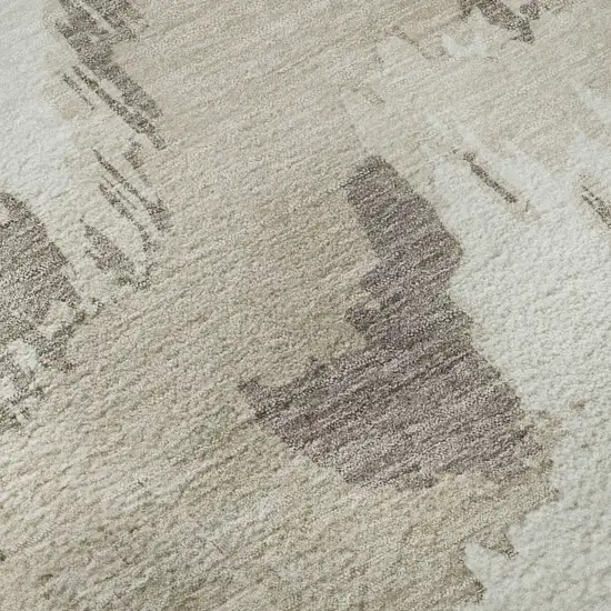 Beige And Ivory Abstract Washable Area Rug With UV Protection Photo 9