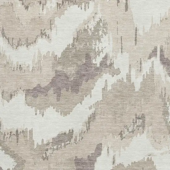 Beige And Ivory Abstract Washable Area Rug With UV Protection Photo 4