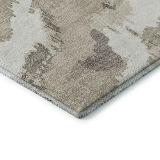 Beige And Ivory Abstract Washable Area Rug With UV Protection Photo 9