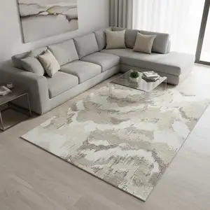 Photo of Beige And Ivory Abstract Washable Area Rug With UV Protection
