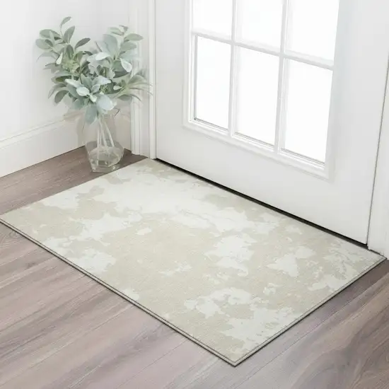 Beige And Ivory Abstract Washable Area Rug With UV Protection Photo 2