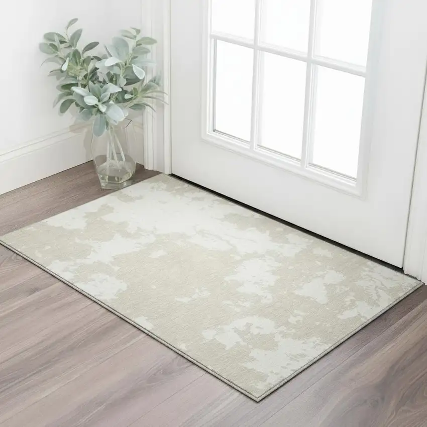Beige And Ivory Abstract Washable Area Rug With UV Protection Photo 2