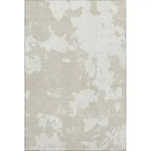 Photo of Beige And Ivory Abstract Washable Area Rug With UV Protection