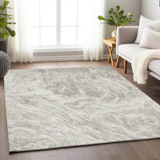 Beige And Ivory Abstract Washable Area Rug With UV Protection Photo 3