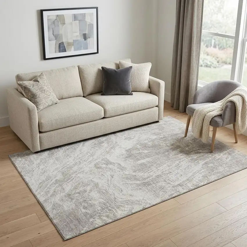 Beige And Ivory Abstract Washable Area Rug With UV Protection Photo 1