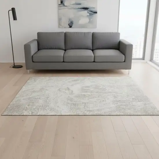 Beige And Ivory Abstract Washable Area Rug With UV Protection Photo 2