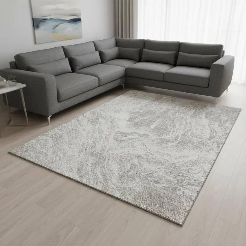 Beige And Ivory Abstract Washable Area Rug With UV Protection Photo 2