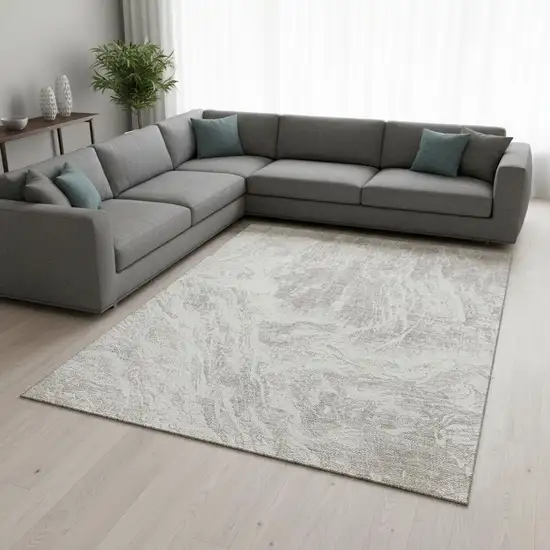 Beige And Ivory Abstract Washable Area Rug With UV Protection Photo 2