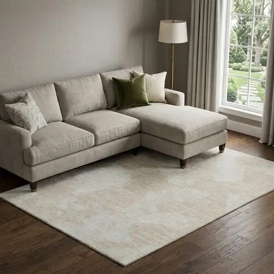 Beige And Ivory Abstract Washable Area Rug With UV Protection Photo 1
