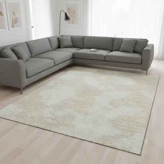 Beige And Ivory Abstract Washable Area Rug With UV Protection Photo 2