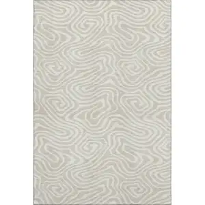 Photo of Beige And Ivory Abstract Washable Area Rug With UV Protection
