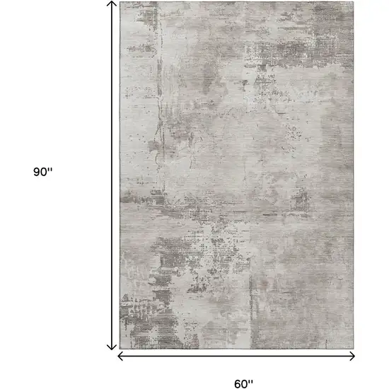 Beige And Ivory Abstract Washable Area Rug With UV Protection Photo 9