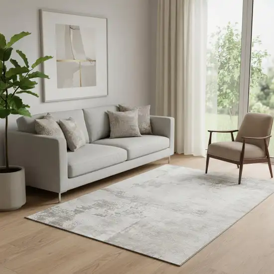 Beige And Ivory Abstract Washable Area Rug With UV Protection Photo 2