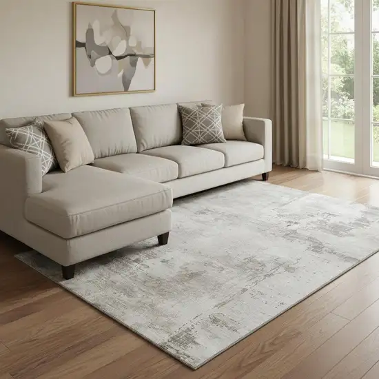 Beige And Ivory Abstract Washable Area Rug With UV Protection Photo 2