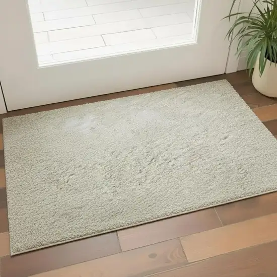 Beige And Ivory Abstract Washable Area Rug With UV Protection Photo 2