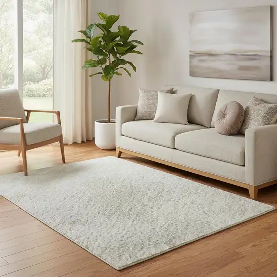 Beige And Ivory Abstract Washable Area Rug With UV Protection Photo 2