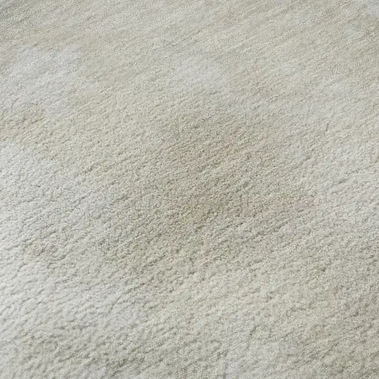 Beige And Ivory Abstract Washable Area Rug With UV Protection Photo 1