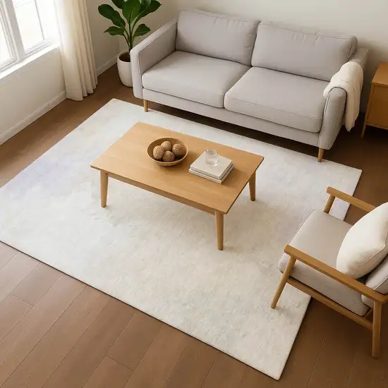 Beige And Ivory Abstract Washable Area Rug With UV Protection Photo 4