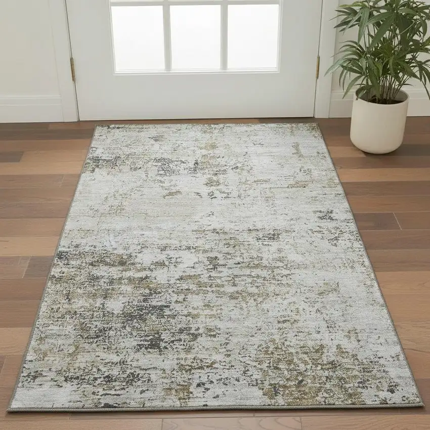Beige And Ivory Abstract Washable Area Rug With UV Protection Photo 2