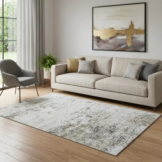 Beige And Ivory Abstract Washable Area Rug With UV Protection Photo 2