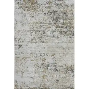 Photo of Beige And Ivory Abstract Washable Area Rug With UV Protection