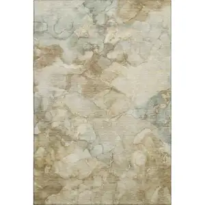 Photo of Beige And Ivory Abstract Washable Area Rug With UV Protection