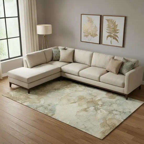 Beige And Ivory Abstract Washable Area Rug With UV Protection Photo 2