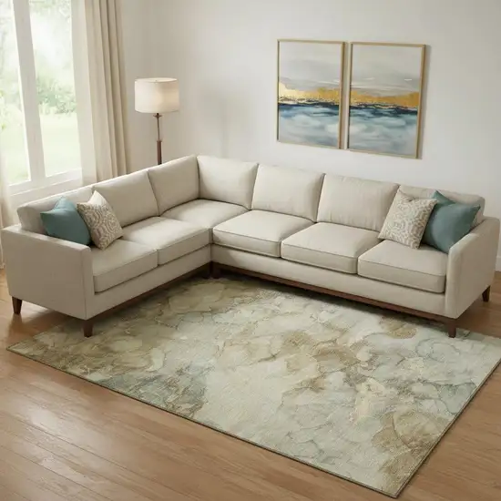 Beige And Ivory Abstract Washable Area Rug With UV Protection Photo 2