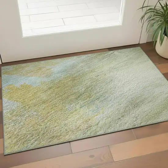 Beige And Ivory Abstract Washable Area Rug With UV Protection Photo 2