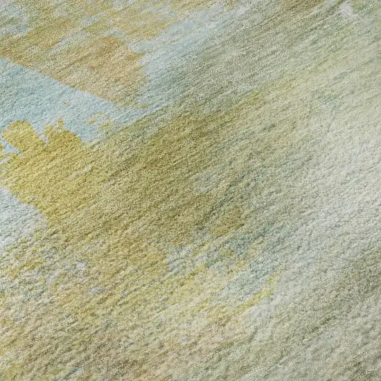 Beige And Ivory Abstract Washable Area Rug With UV Protection Photo 1