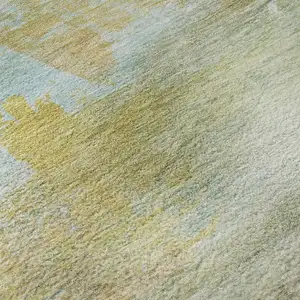 Photo of Beige And Ivory Abstract Washable Area Rug With UV Protection