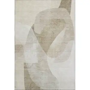 Photo of Beige And Ivory Abstract Washable Area Rug With UV Protection