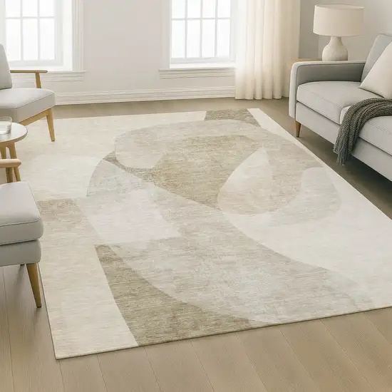 Beige And Ivory Abstract Washable Area Rug With UV Protection Photo 5