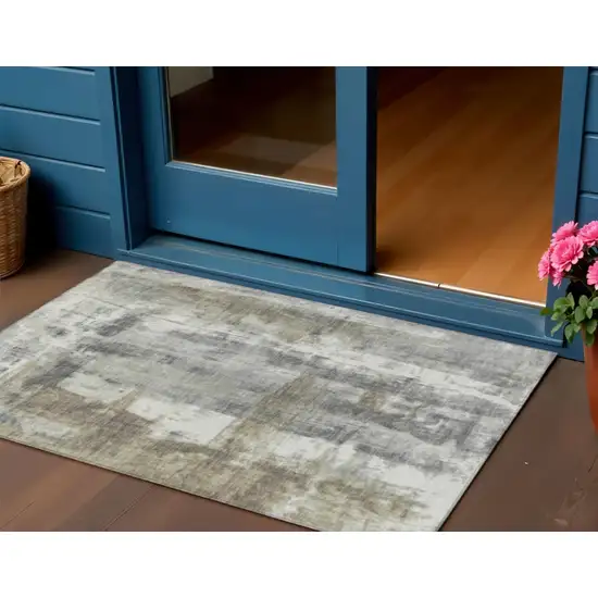 Beige And Ivory Abstract Washable Indoor Outdoor Area Rug Photo 2