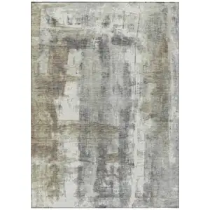 Photo of Beige And Ivory Abstract Washable Indoor Outdoor Area Rug