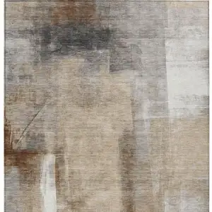 Photo of Beige And Ivory Abstract Washable Indoor Outdoor Area Rug