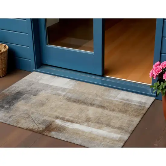Beige And Ivory Abstract Washable Indoor Outdoor Area Rug Photo 2