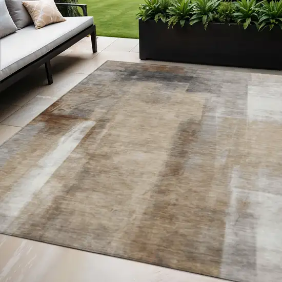 Beige And Ivory Abstract Washable Indoor Outdoor Area Rug Photo 2