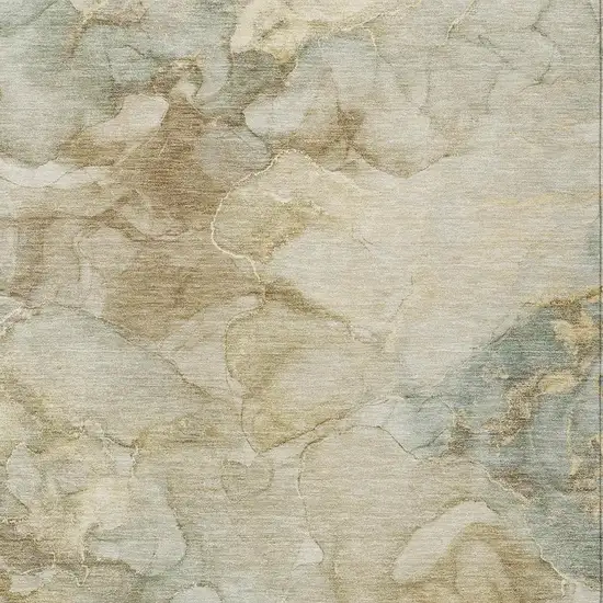 Beige And Ivory Abstract Washable Indoor Outdoor Area Rug Photo 3