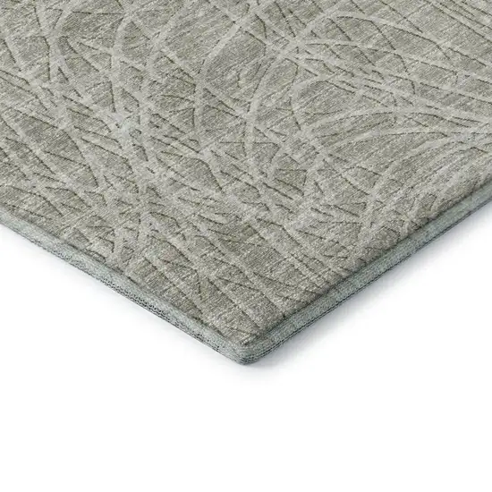 Beige And Ivory Abstract Washable Indoor Outdoor Area Rug Photo 4