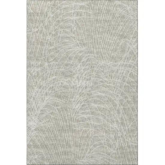 Beige And Ivory Abstract Washable Indoor Outdoor Area Rug Photo 4