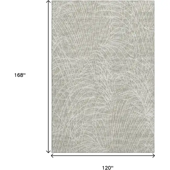 Beige And Ivory Abstract Washable Indoor Outdoor Area Rug Photo 3
