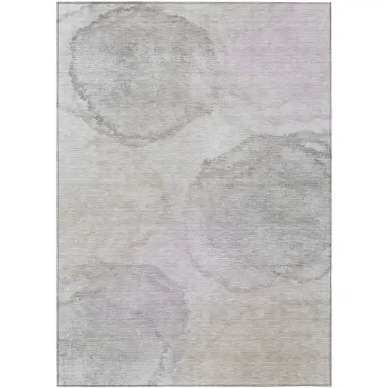 Beige And Ivory Abstract Washable Indoor Outdoor Area Rug Photo 1