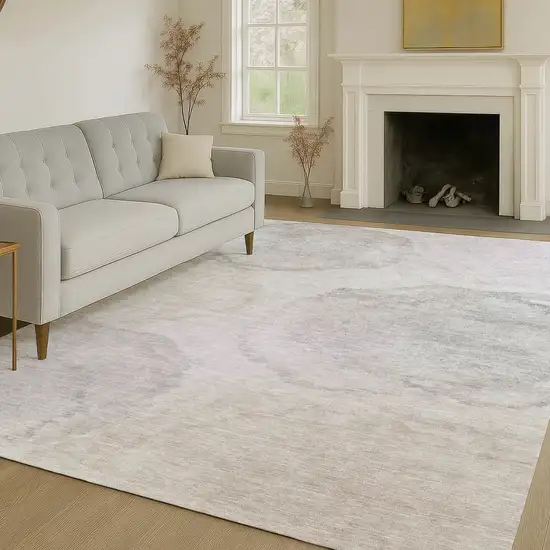 Beige And Ivory Abstract Washable Indoor Outdoor Area Rug Photo 6