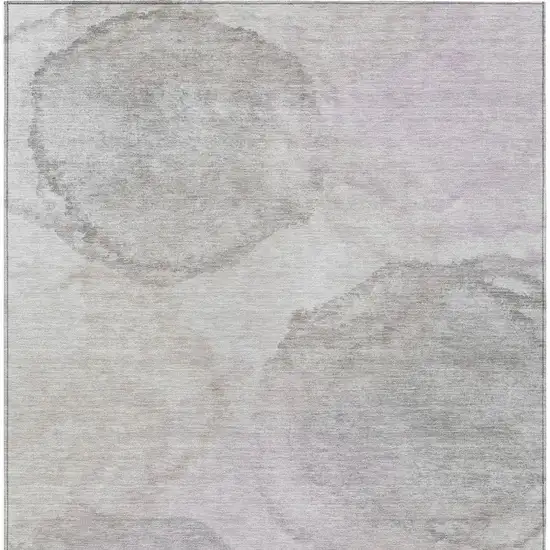 Beige And Ivory Abstract Washable Indoor Outdoor Area Rug Photo 3
