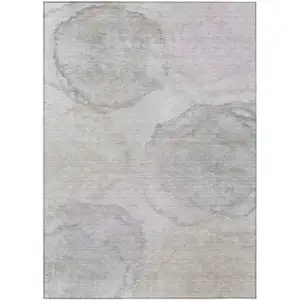Photo of Beige And Ivory Abstract Washable Indoor Outdoor Area Rug