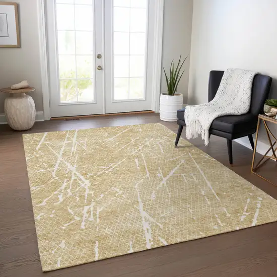 Beige And Ivory Abstract Washable Indoor Outdoor Area Rug Photo 5