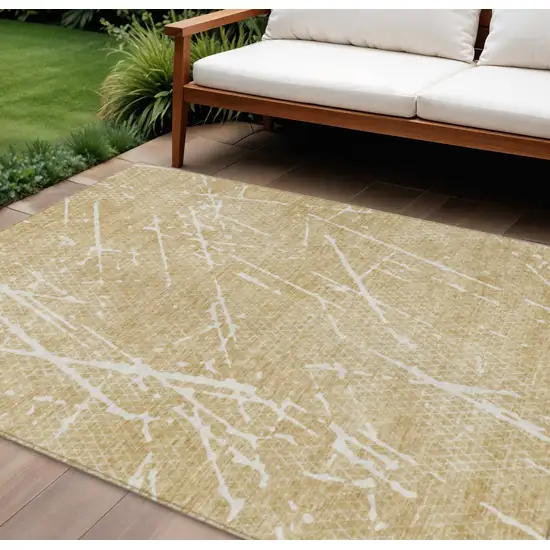 Beige And Ivory Abstract Washable Indoor Outdoor Area Rug Photo 1